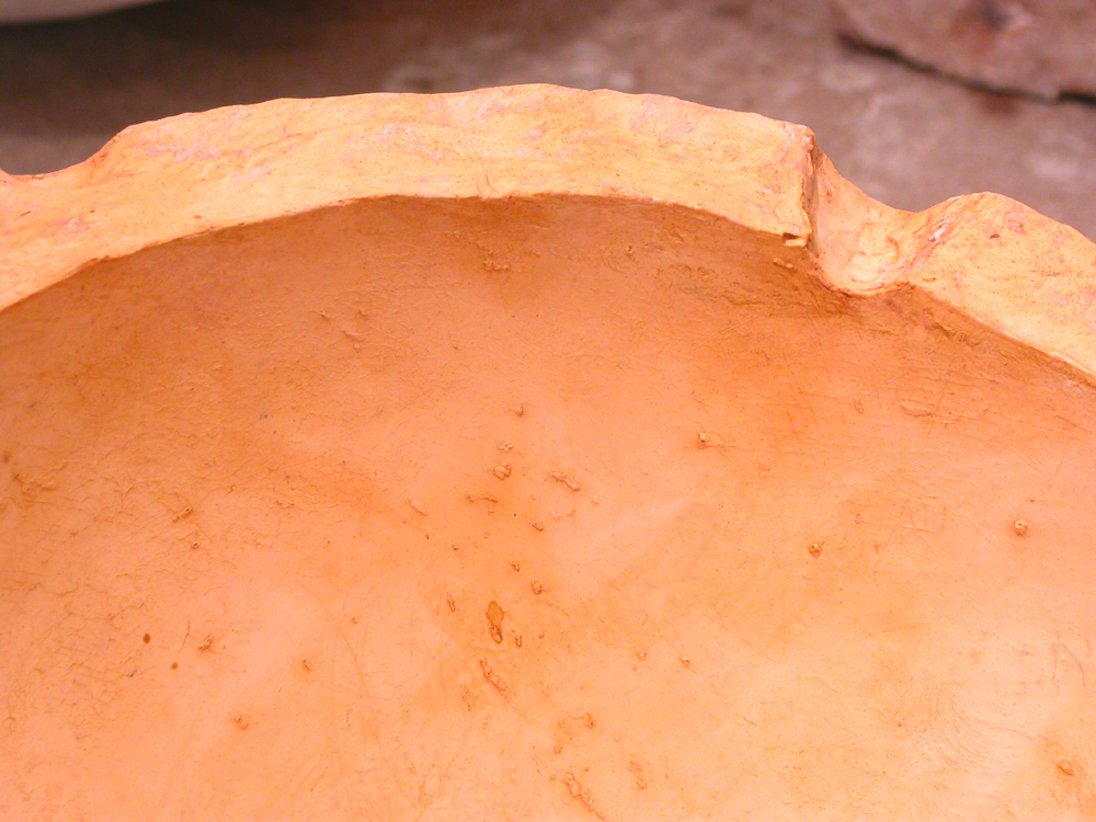 Shell Game. 2005. Artist’s blood, lead, resin. 68 x 120 x 48" (dimensions variable). Prepped ball mold. Darrin Hallowell
