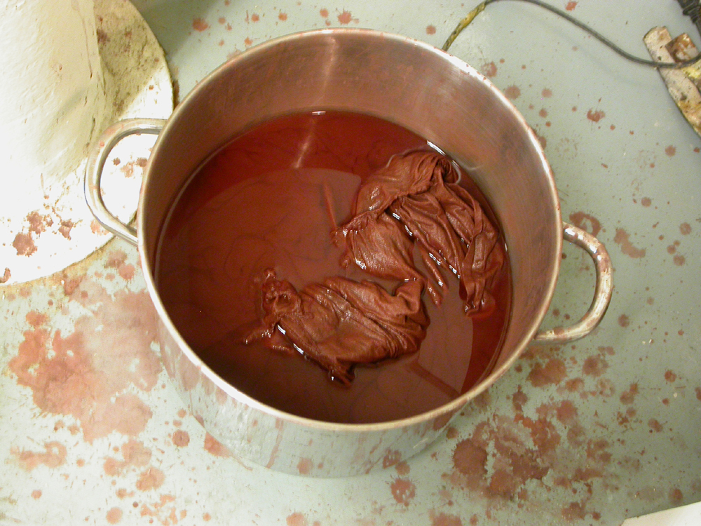 His and Hers. 2007. Process Image 1. Soaking muslin in iron oxide solution. Ariadne's Clew.