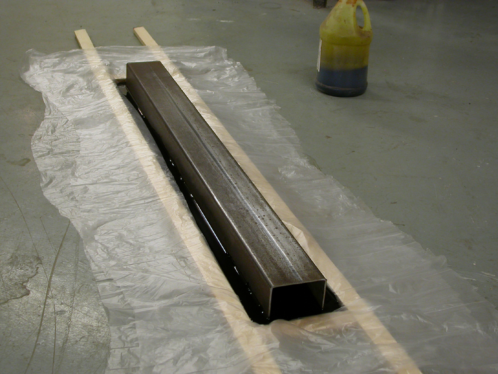 Eat Sleep Drink Dream. 2007. Steel. 49 x 7 x 10. Soaking in acid bath. Darrin Hallowell