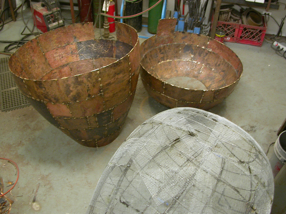 Open Vessel. 2009. Bronze. 55 x 37 x 37". Forms are ready for assembly. Darrin Hallowell